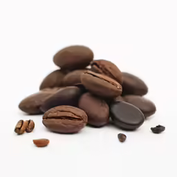coffee beans scattered on white background