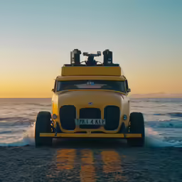 the yellow bus has four wheels on the back