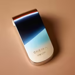 an old style phone sitting on top of a table