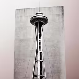a black and white photo of the space needle