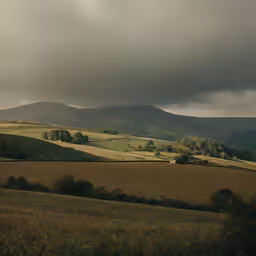 the landscape is an incredible scene of green hills