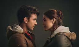 an image of two people standing together