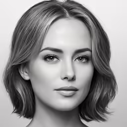 the woman is posing for a black and white photo