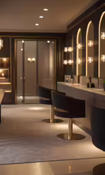 an elegant bathroom with lots of light shining through the lights