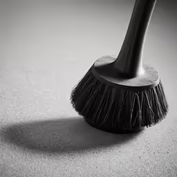 black and white photograph of a broom