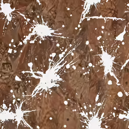 white circles in a blurry design on brown