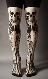 skeleton print tights with an interesting design on the knees