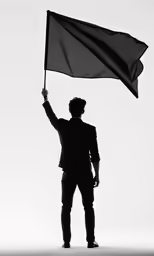 a man holding a flag in front of a white background
