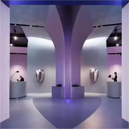 a room with some unique round mirrors and a person sitting