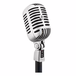 an old fashioned microphone is shown on the microphone stand