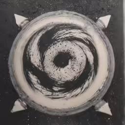 a white bowl with different types of patterns on it