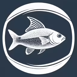 black and white fish in a glass bowl on a table
