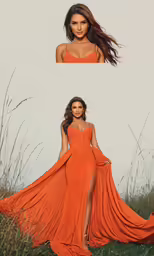 a woman in an orange gown standing in tall grass