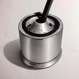 a metal device sitting on top of a table