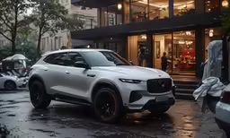 a white volvo suv parked in front of a building