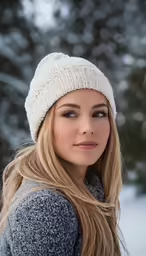 a beautiful woman with a big smile and long blonde hair