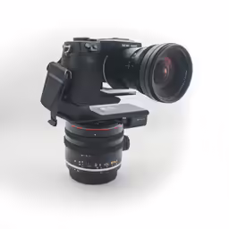 a camera with an adapter on a tripod