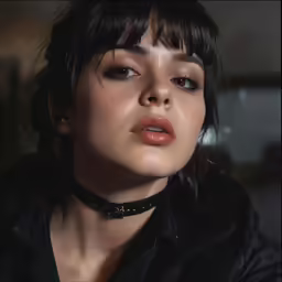 a close up of a person wearing a leather choker
