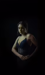 an image of woman wearing a dress and bra