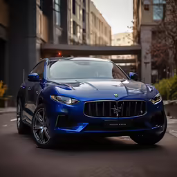 a large blue maserage parked in front of a very tall building