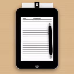 a notepad and pen on a table top