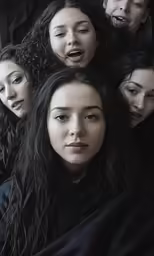 a group of girls with their mouths open