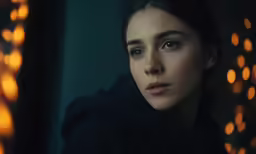 an image of a girl that is looking at the camera