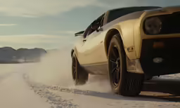 a car driving down a snow covered road