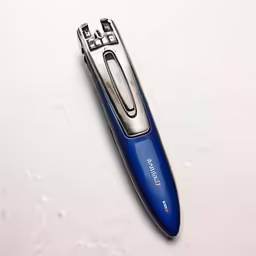 a blue and silver pen laying on a white table
