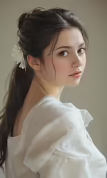 the woman with flower in her hair