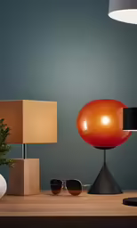 some modern lighting and some other furniture on a table