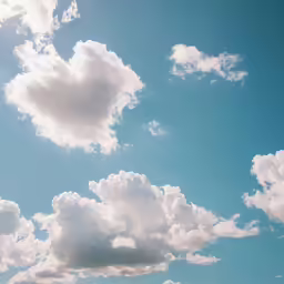 the blue sky has several clouds on it