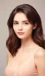 an attractive woman with breast and cleavage in nude bra
