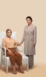 two women in matching outfits hold hands with each other
