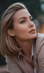 a beautiful woman with an earring on her head