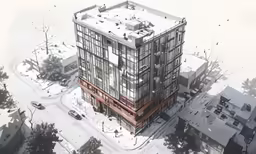 an aerial view of a four - story building in winter