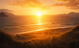a sun setting over a body of water
