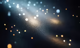 blurry image of lights coming off a window