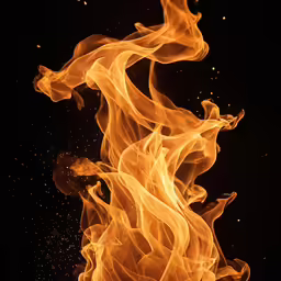 fire is blazing on a black background