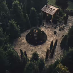 an aerial shot of a house surrounded by trees