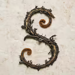 the letter c made out of vines and twigs