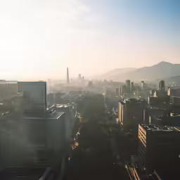 the view from a high rise overlooking an city