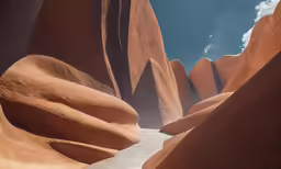 a pathway between two different orange rocks
