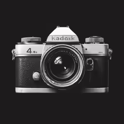 black and white photo of a camera