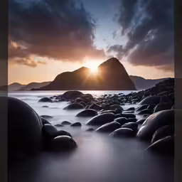 an abstract photograph of a rocky beach under a sunset