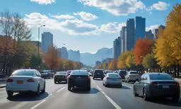 traffic moves through the city during the day
