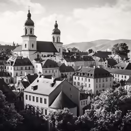 a black and white image of old town in europe