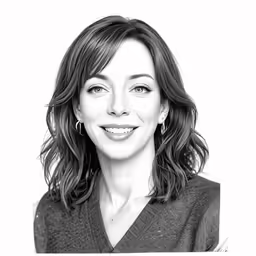 a smiling woman with dark hair