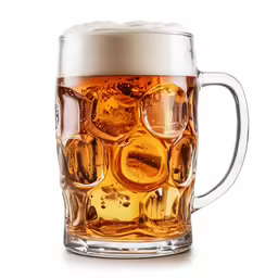the beer is being poured into a large mug