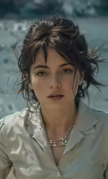a woman wearing pearls and pearls in her hair